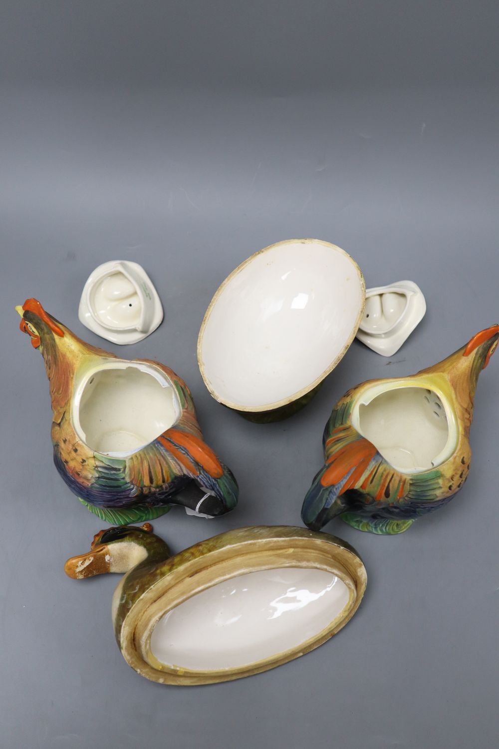 Two ceramic chicken teapots and an Italian duck box, tallest 24cm